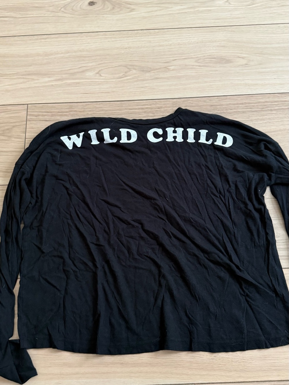 AMERICAN EAGLE “Wild Child” Black Long-Sleeve crop Top